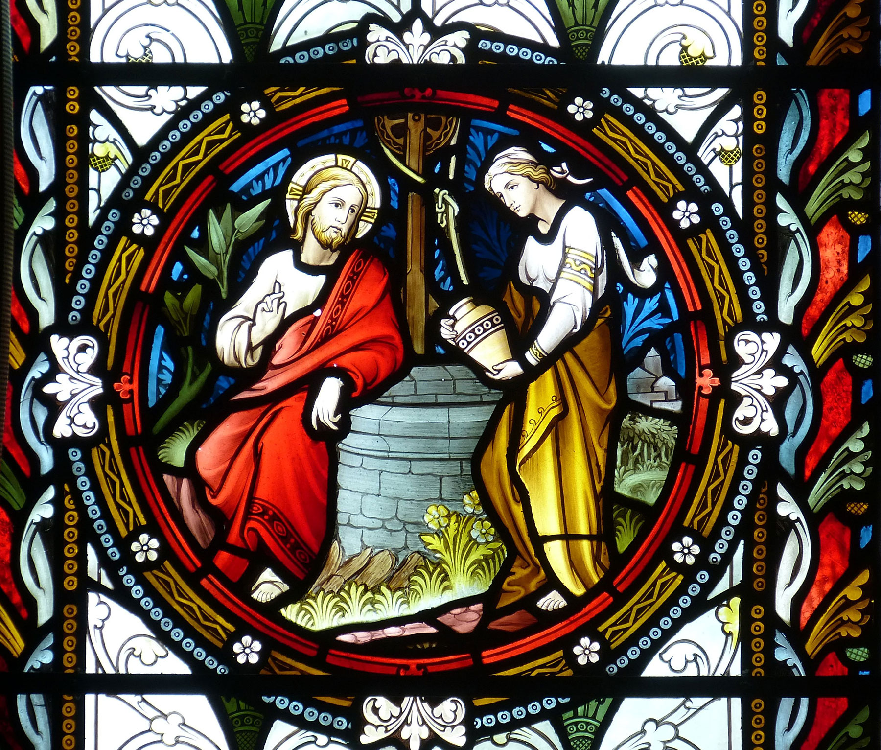Kirchenfensterausschnitt: Die Frau am Jakobsbrunnen mit Jesus im Gespräch über das wahre Wasser, das er den Menschen bringt (Foto: falco, pixabay)